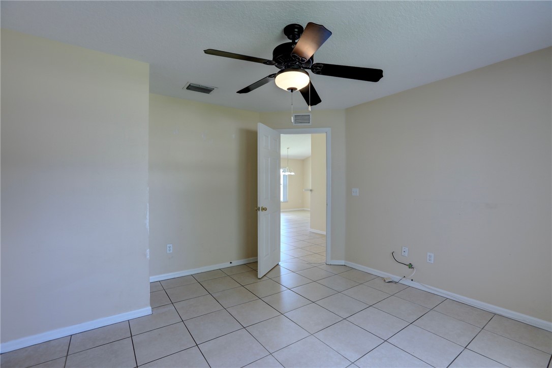 113 Drake Way Sebastian, FL 32958 - Photo 17 of 36 wooden floor in an empty room