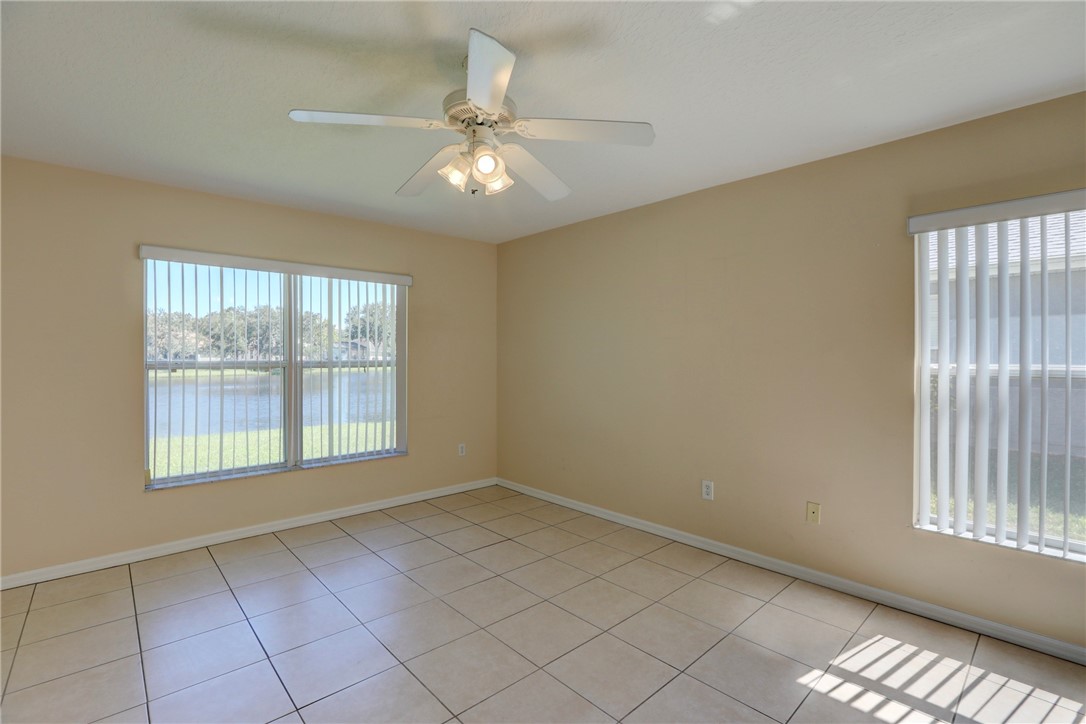 113 Drake Way Sebastian, FL 32958 - Photo 23 of 36 a view of an empty room with a window
