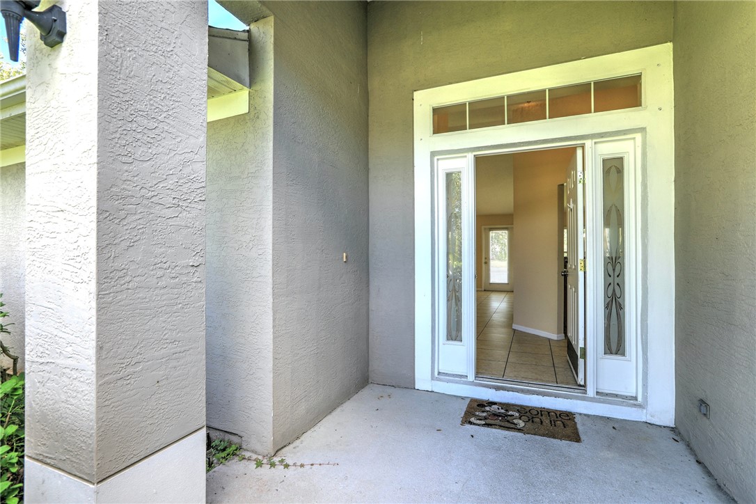 113 Drake Way Sebastian, FL 32958 - Photo 8 of 36 a view of an outdoor space with swimming pool