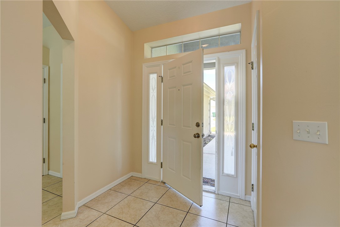 113 Drake Way Sebastian, FL 32958 - Photo 9 of 36 a view of a bathroom with a glass door