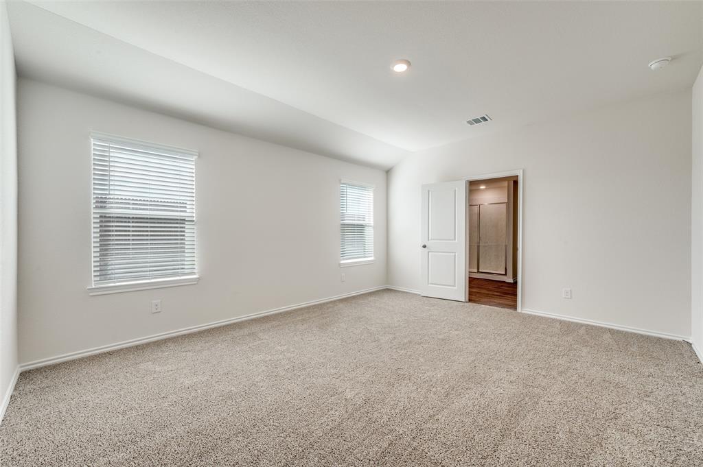 775 Tiger Lily Way Pilot Point, TX 76258 - Photo 8 of 13 an empty room with windows and closet