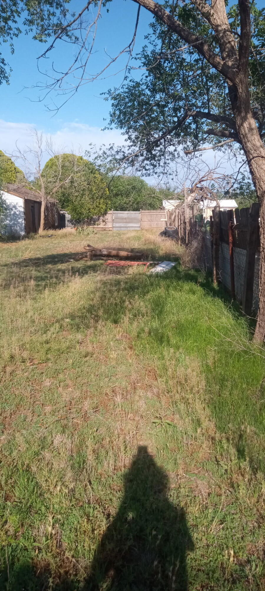 815 South 3rd Street Slaton, TX 79364 - Photo 9 of 9 a view of a yard with an outdoor space
