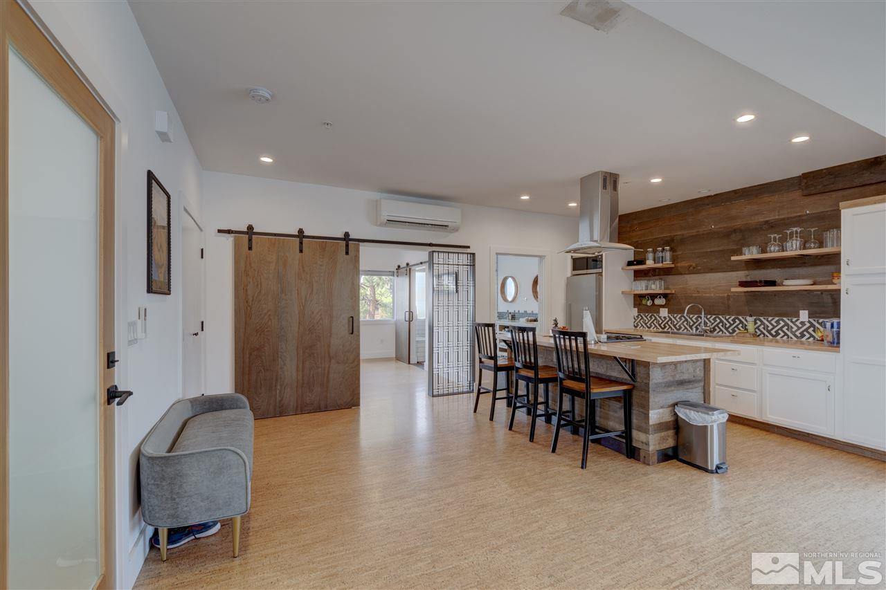 525 Roberts Street Reno, NV 89502 - Photo 26 of 40 a dining room with furniture and a kitchen view