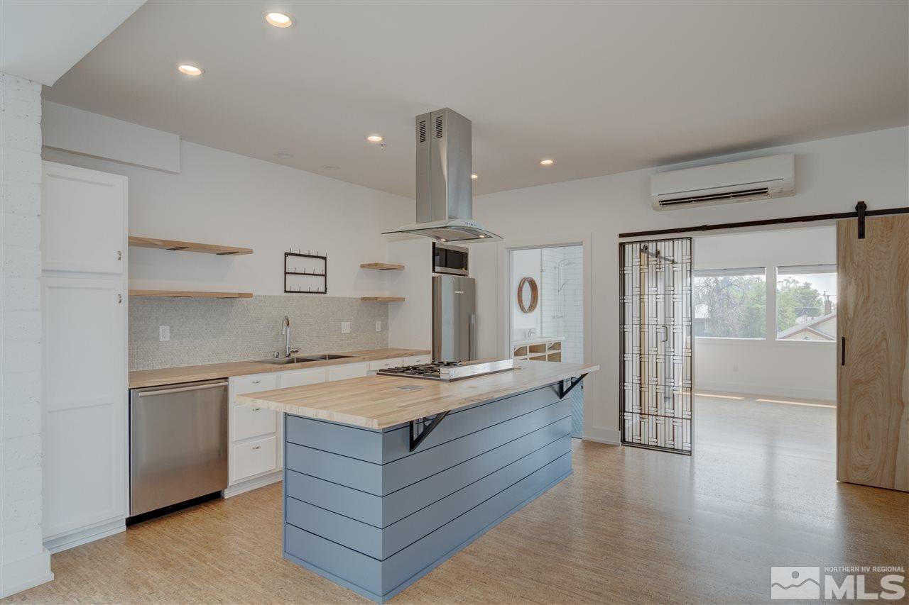 525 Roberts Street Reno, NV 89502 - Photo 10 of 40 a large kitchen with a stove and a refrigerator