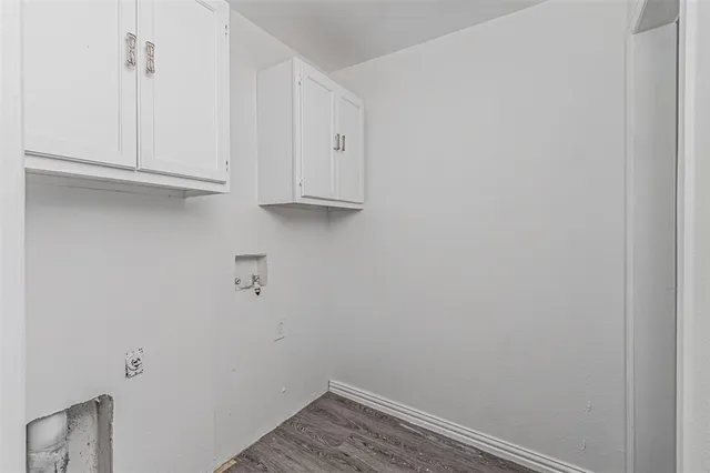 a view of small space with wooden floor