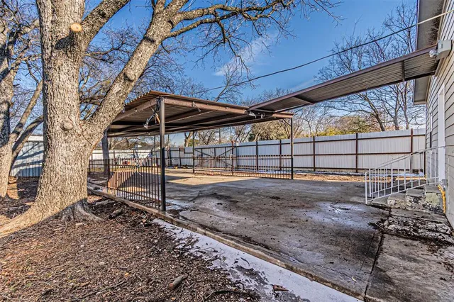 a view of a backyard with a patio