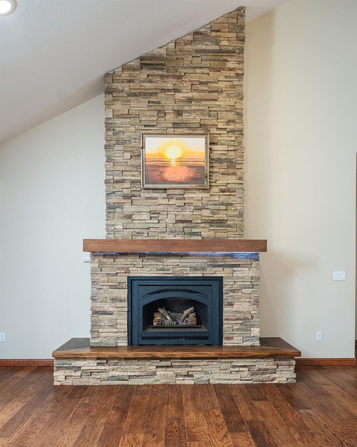 9080 El Dorado Trail Mountain Ranch, CA 95246 - Photo 15 of 48 a living room with a fireplace