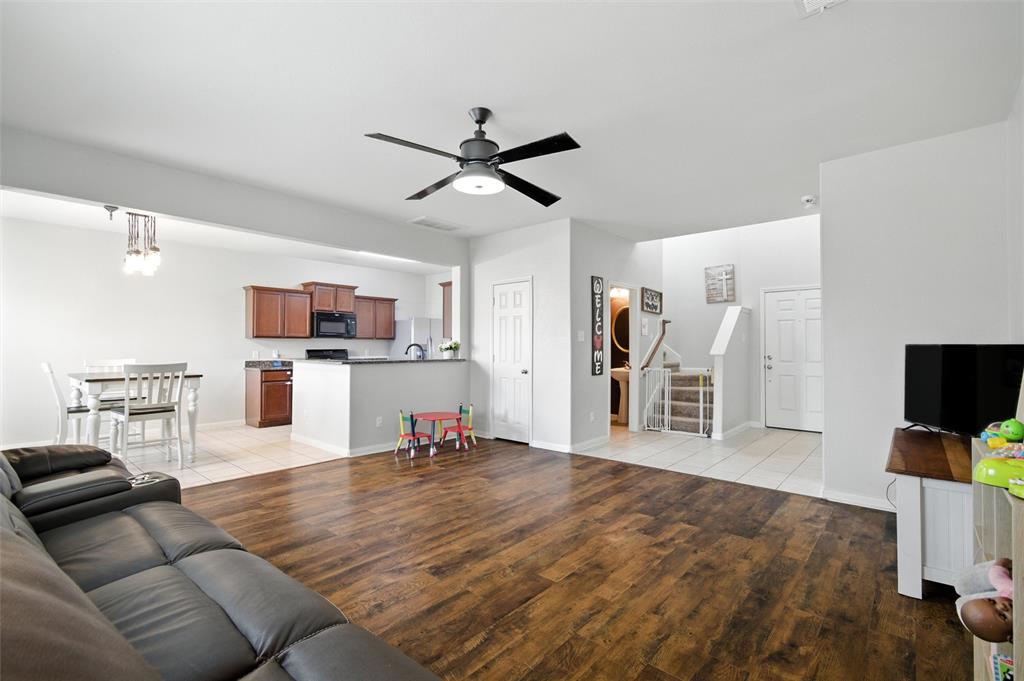 1100 Port Way Crowley, TX 76036 - Photo 13 of 31 a living room with furniture and kitchen view