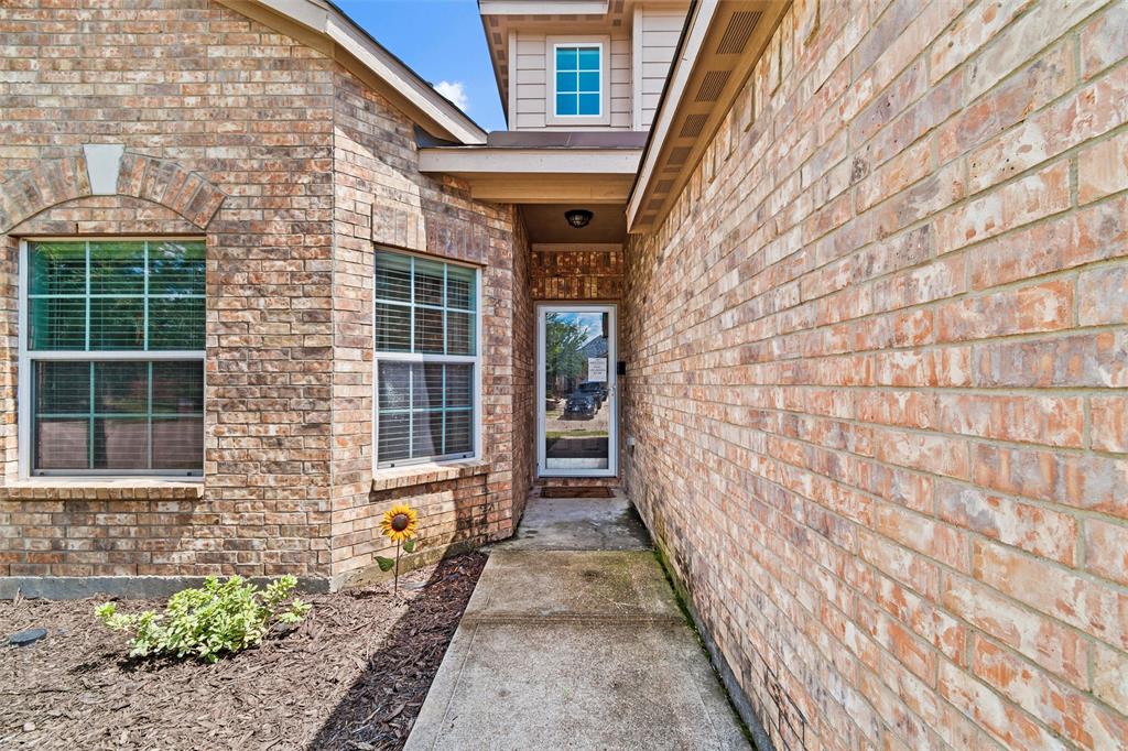 1100 Port Way Crowley, TX 76036 - Photo 2 of 31 a view of a pathway with a house