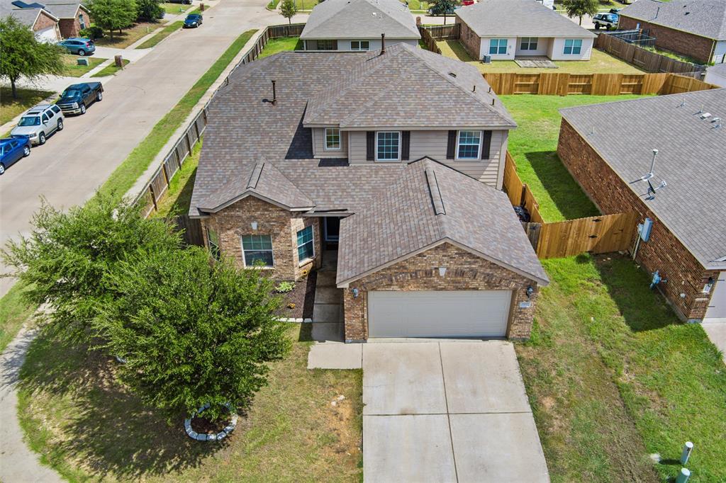 1100 Port Way Crowley, TX 76036 - Photo 5 of 31 an aerial view of a house with a yard