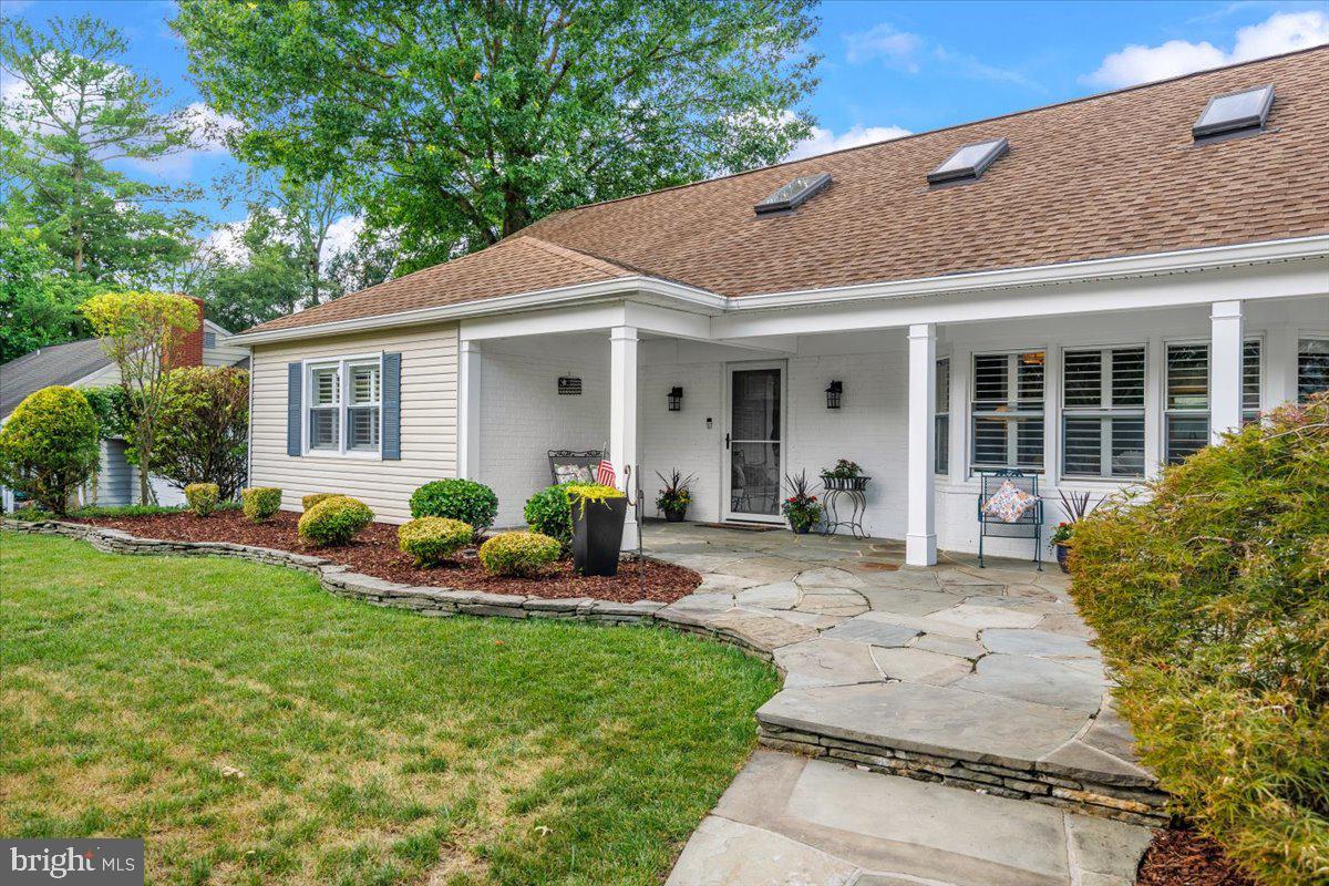 12127 Long Ridge Lane Bowie, MD 20715 - Photo 4 of 46 Custom designed generous flagstone patio