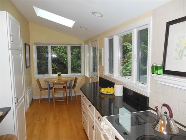 70 Ward Street Lexington, MA 02421 - Photo 8 of 12 a view of a dining room with furniture window and outside view