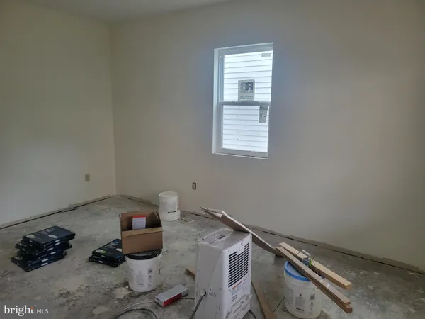 a room with furniture and a window