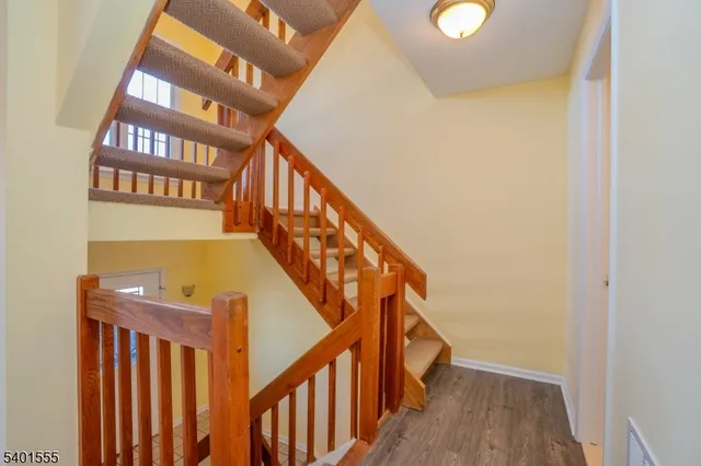 a view of a hallway with windows