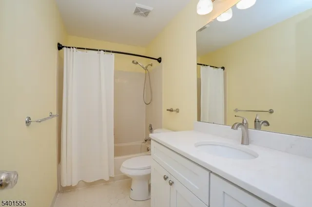 a view of a hallway with windows