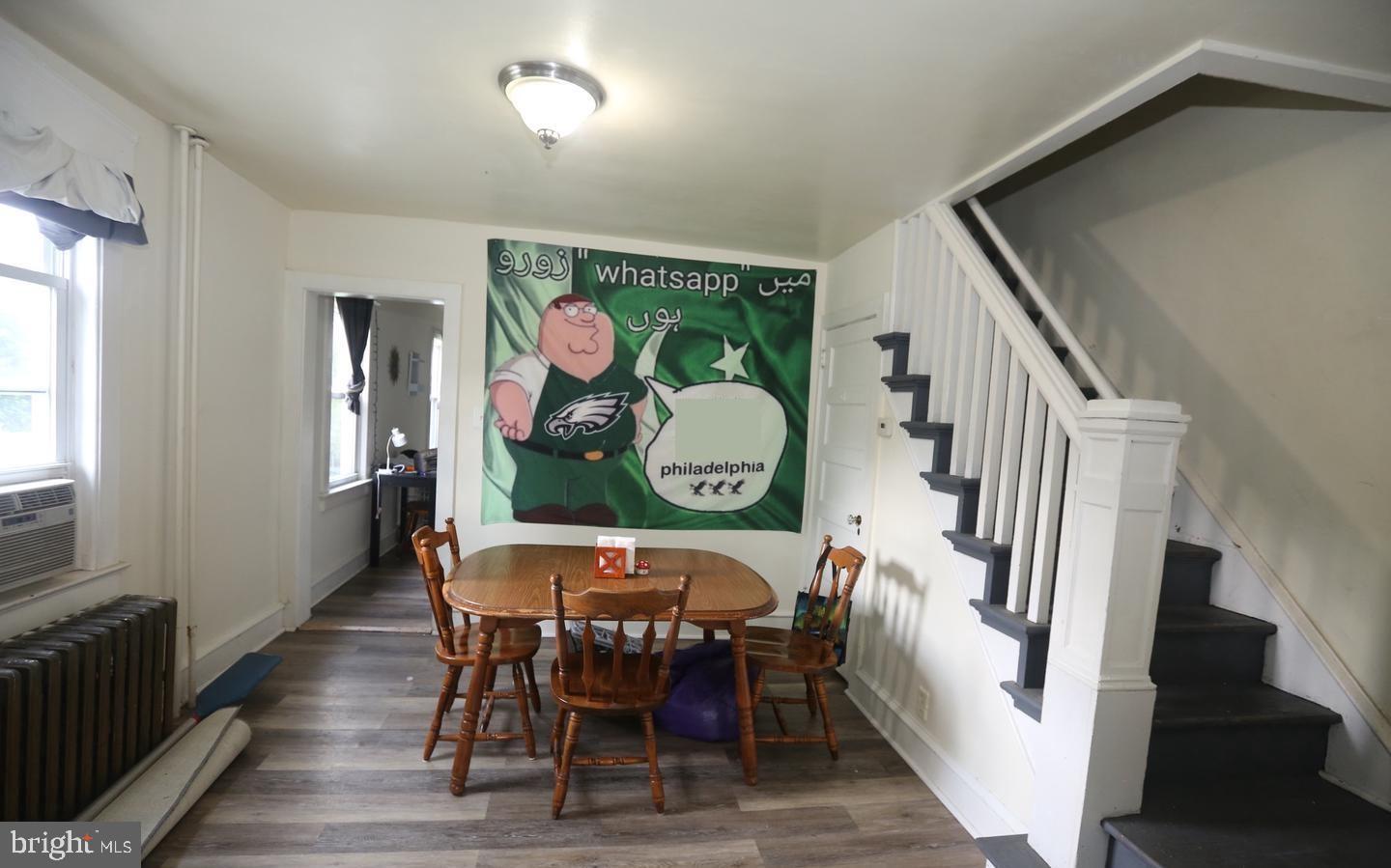 114 Ellis Street Glassboro, NJ 08028 - Photo 5 of 11 a view of a dining room with furniture and wooden floor