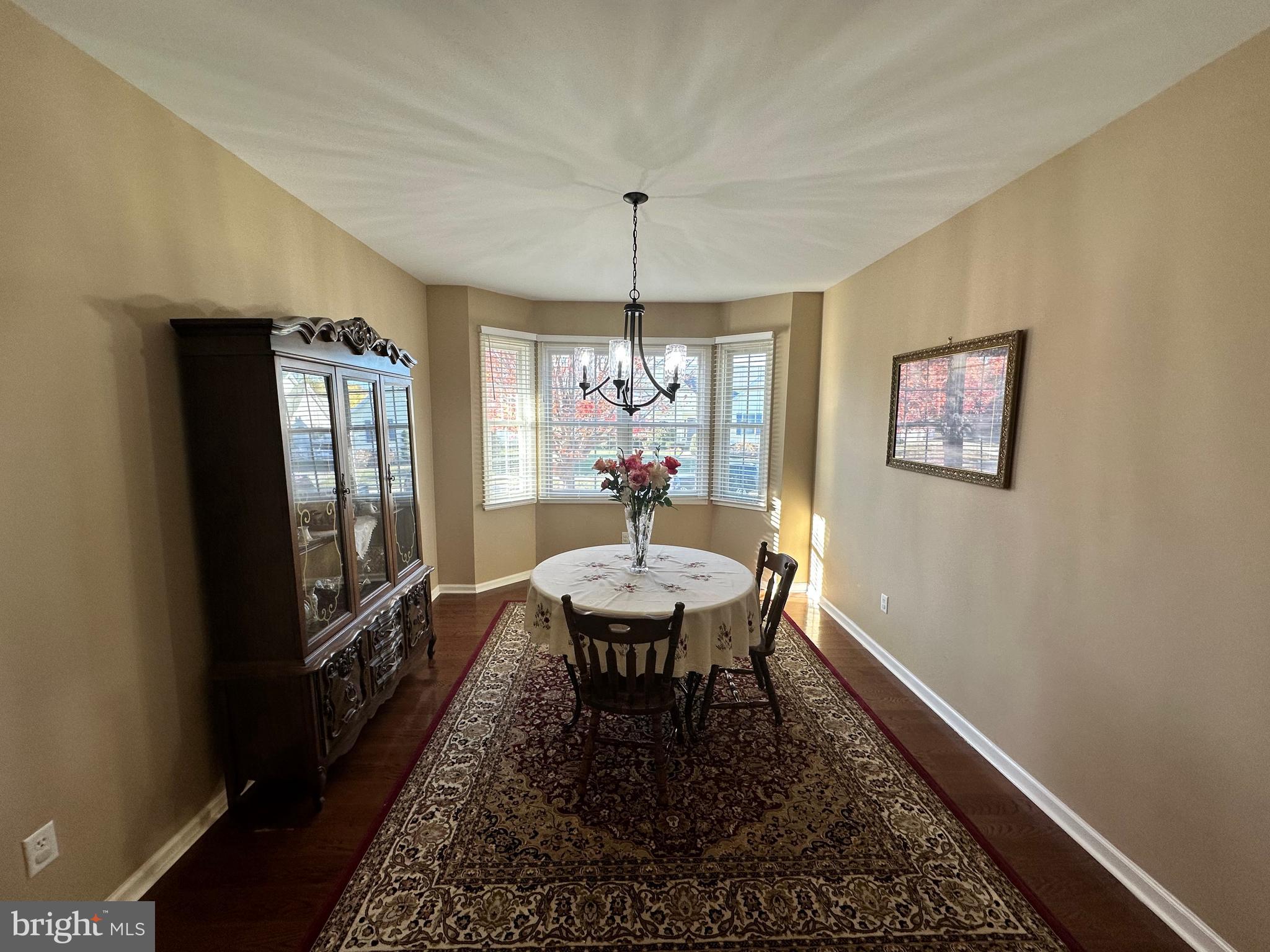 9 Kenmare Way Rehoboth Beach, DE 19971 - Photo 5 of 8 a dining room with furniture window and wooden floor