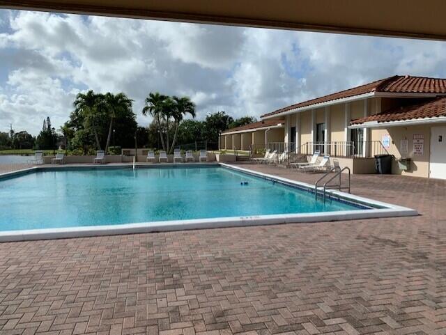 4154 Inverrary Drive, Unit 407 Lauderhill, FL 33319 - Photo 39 of 39 a view of a house with a yard