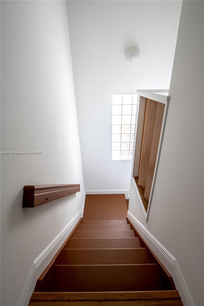 16227 Southwest 139th Court, Unit 2 Miami, FL 33177 - Photo 10 of 10 a view of entryway with wooden floor
