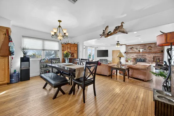 a kitchen with stainless steel appliances a sink cabinets and a refrigerator