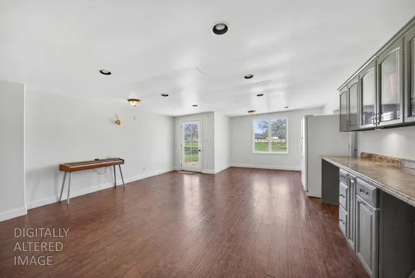a view of living room with a flat screen tv