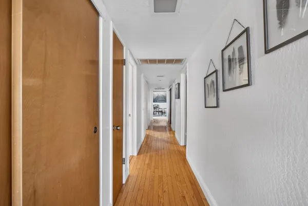 a view of bath tub sitting in a bathroom next to a window