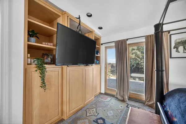 a view of a house with outdoor space and sitting area