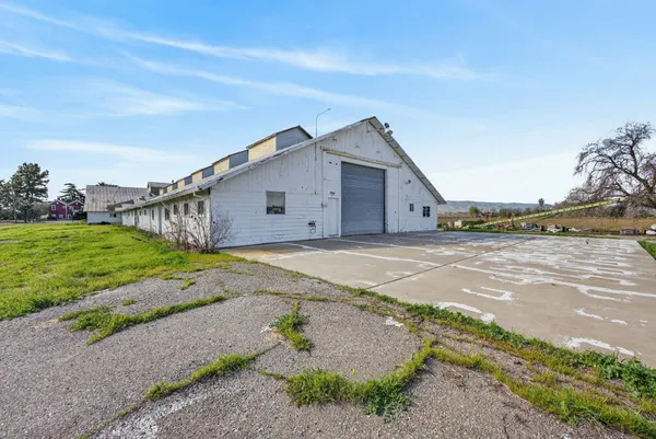 a bathroom with a tub and shower