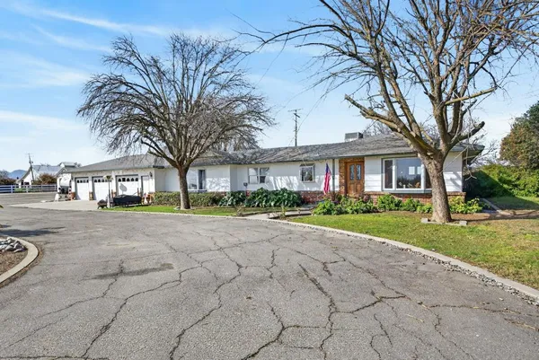 a kitchen with stainless steel appliances granite countertop a stove and a sink