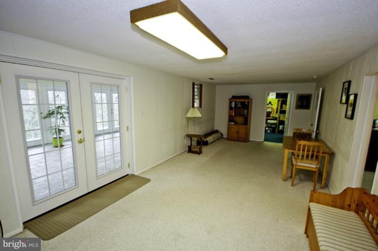 8245 Rupert Road South Millersville, MD 21108 - Photo 13 of 30 a view of a livingroom with furniture and a window