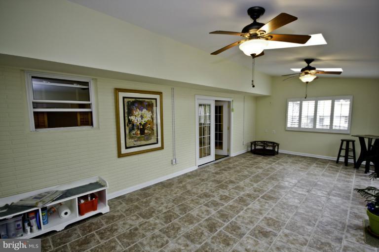 8245 Rupert Road South Millersville, MD 21108 - Photo 3 of 30 a view of a livingroom with a workspace