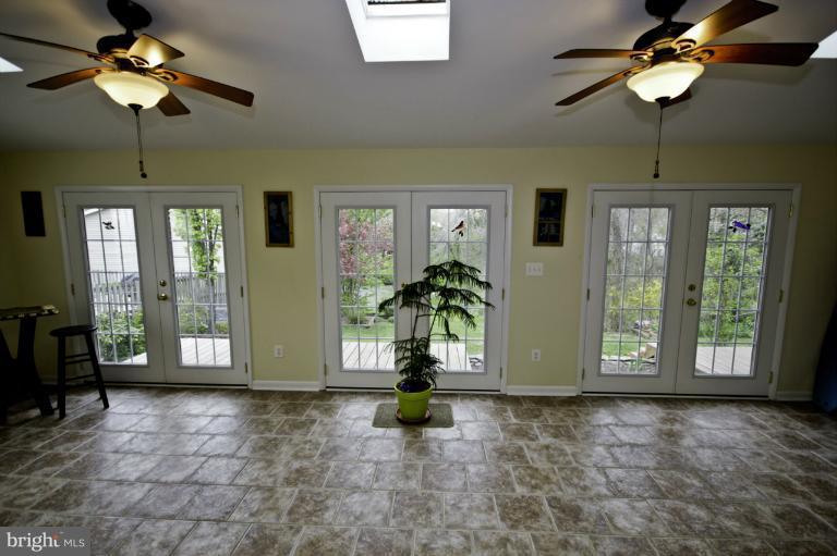 8245 Rupert Road South Millersville, MD 21108 - Photo 26 of 30 a view of an entryway with a chandelier