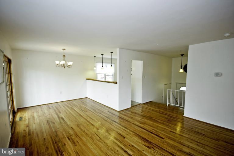 8245 Rupert Road South Millersville, MD 21108 - Photo 28 of 30 a view of empty room with wooden floor