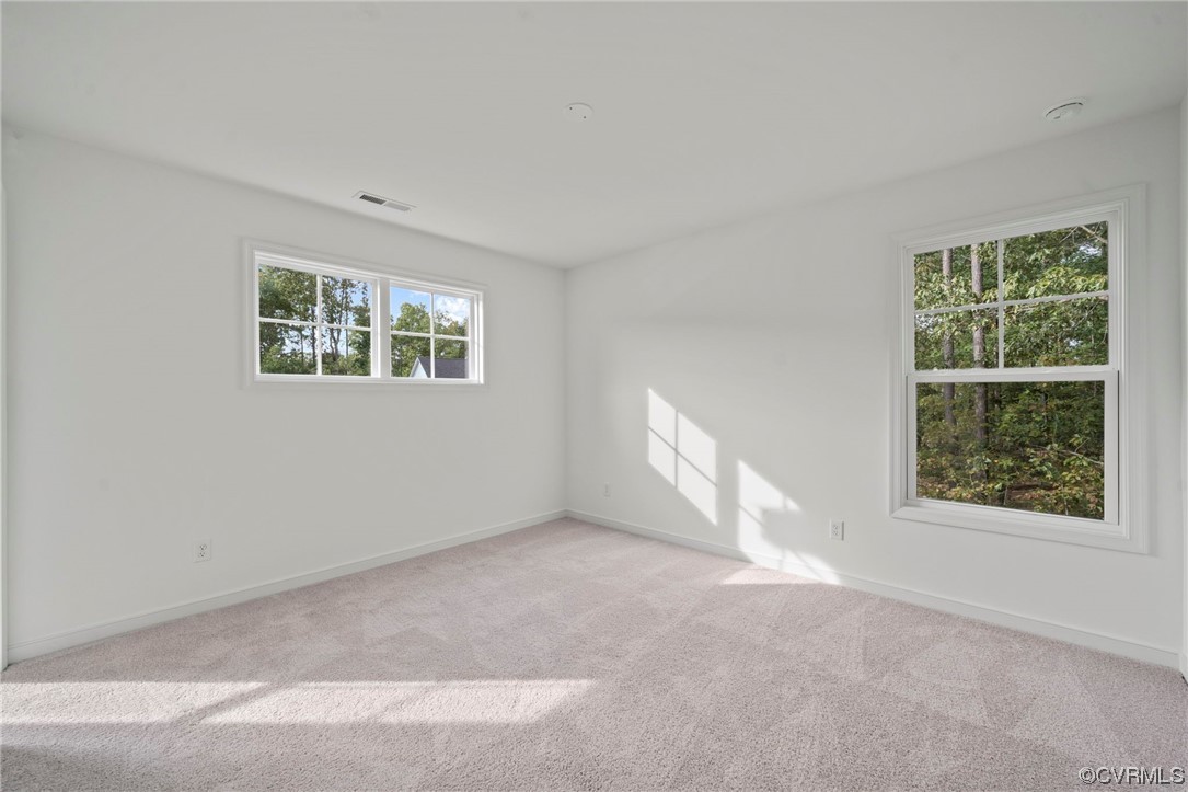 8506 Freebridge Road Chesterfield, VA 23832 - Photo 19 of 37 an empty room with windows