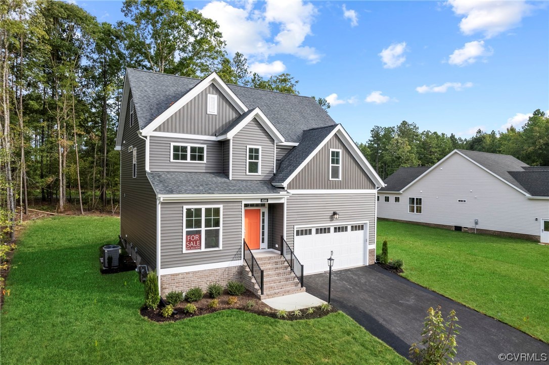 8506 Freebridge Road Chesterfield, VA 23832 - Photo 2 of 37 a front view of house with yard and green space