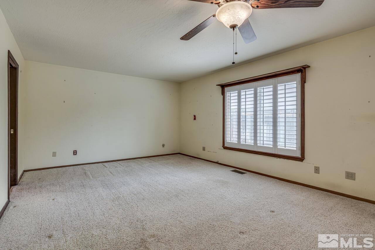 14340 Virginia Foothills Drive Reno, NV 89521 - Photo 8 of 24 a view of an empty room with a window