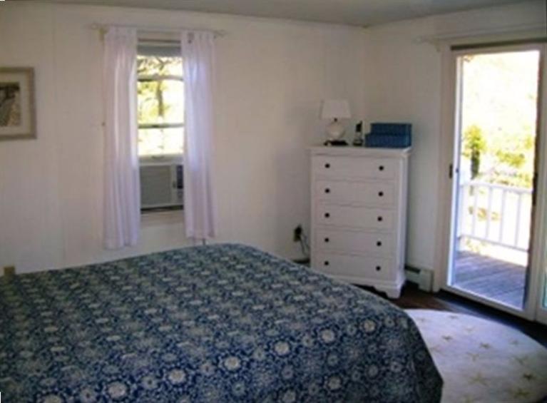 2 Trout Brook Road Harwich, MA 02645 - Photo 14 of 21 a bedroom with a bed and a window