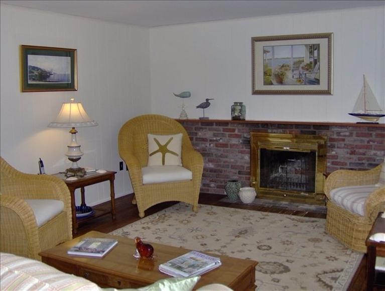 2 Trout Brook Road Harwich, MA 02645 - Photo 3 of 21 a living room with furniture and a fireplace