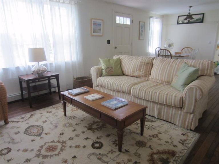 2 Trout Brook Road Harwich, MA 02645 - Photo 5 of 21 a living room with furniture a rug and a window