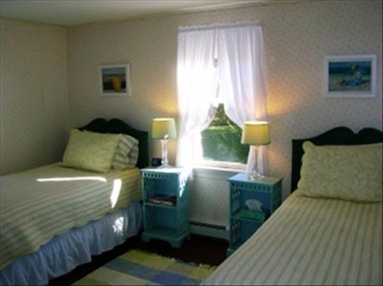 2 Trout Brook Road Harwich, MA 02645 - Photo 6 of 21 a bedroom with a bed and windows
