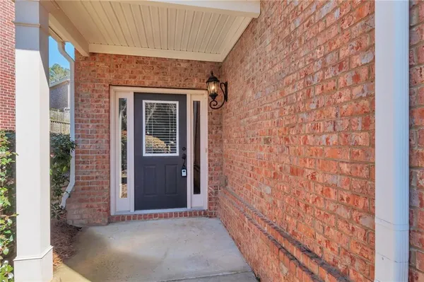 a view of a brick house with a door
