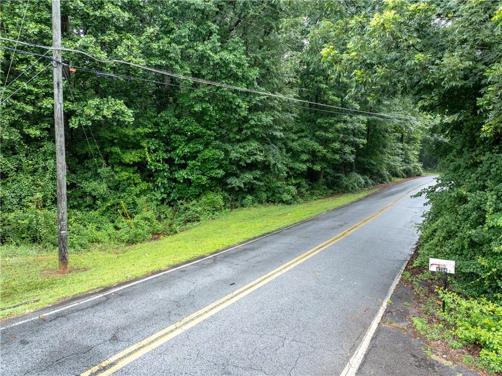 4225 Weelaunee Road Ellenwood, GA 30294 - Photo 13 of 15 a view of a yard with a street