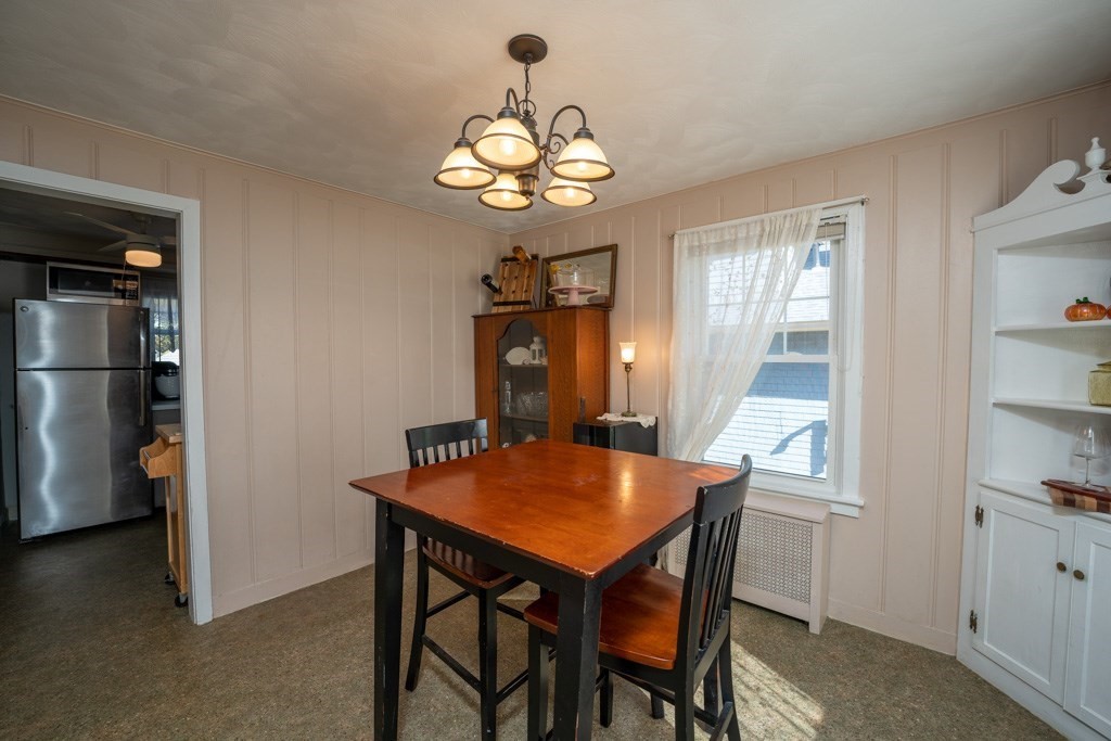 44 Hillside Avenue West Springfield, MA 01089 - Photo 13 of 34 a view of a dining room with furniture window and wooden floor