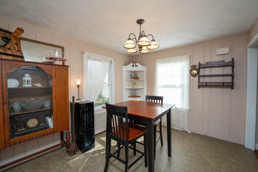 44 Hillside Avenue West Springfield, MA 01089 - Photo 14 of 34 a view of a dining room with furniture and chandelier