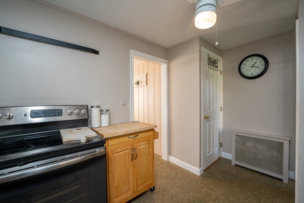 44 Hillside Avenue West Springfield, MA 01089 - Photo 17 of 34 a kitchen with a stove and a microwave