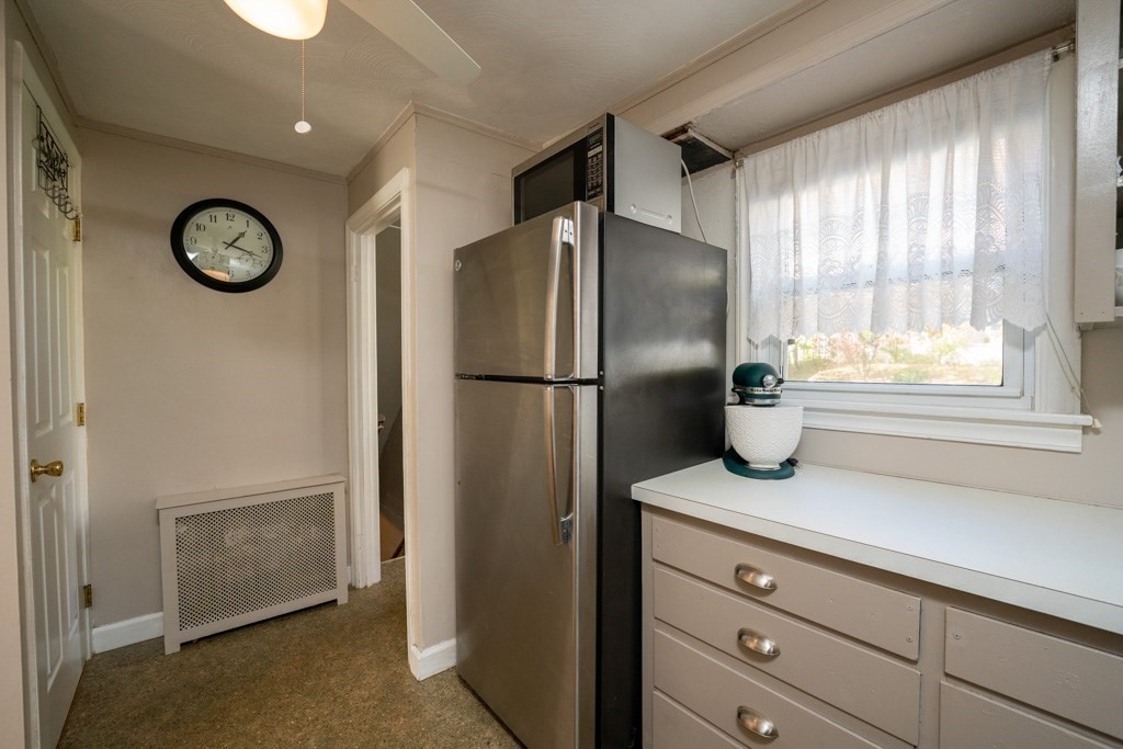 44 Hillside Avenue West Springfield, MA 01089 - Photo 18 of 34 a kitchen with a refrigerator and cabinets