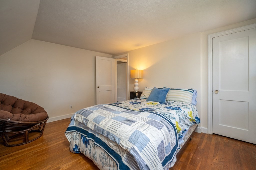 44 Hillside Avenue West Springfield, MA 01089 - Photo 21 of 34 a bedroom with a bed and a couch