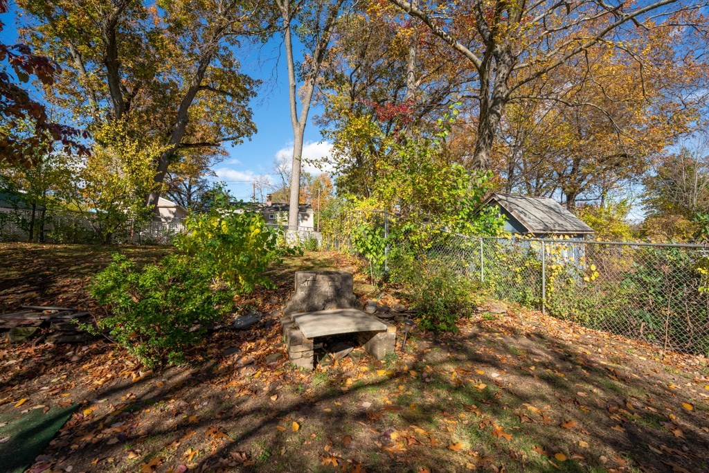 44 Hillside Avenue West Springfield, MA 01089 - Photo 29 of 34 a backyard of a house with lots of green space