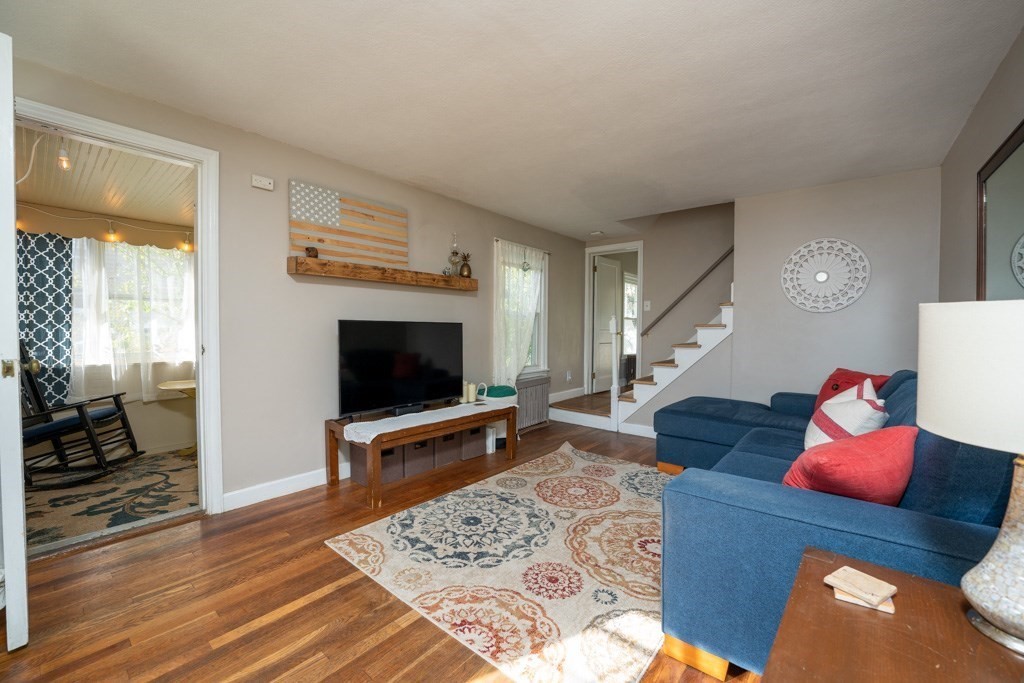 44 Hillside Avenue West Springfield, MA 01089 - Photo 3 of 34 a living room with furniture and a flat screen tv