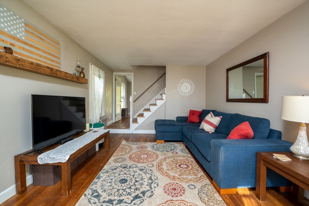 44 Hillside Avenue West Springfield, MA 01089 - Photo 4 of 34 a living room with furniture and a flat screen tv